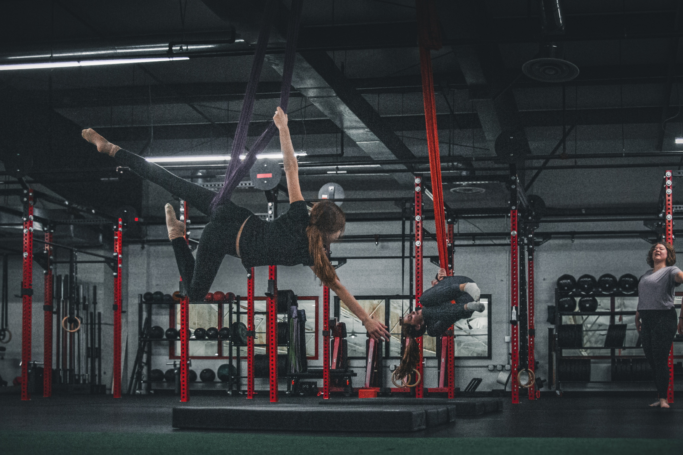 Two members training on aerial silks at Full Circle Fitness
